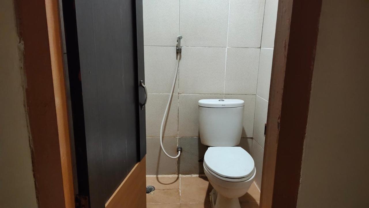 De' Premium Hotel Kartini Palembang Bagian luar foto